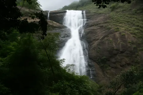 Plan your trip to Palaruvi Falls in Courtallam with Karthi Travels® - View 4