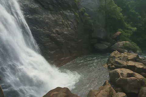 Plan your trip to Palaruvi Waterfalls in Kollam with Karthi Travels® - View 3