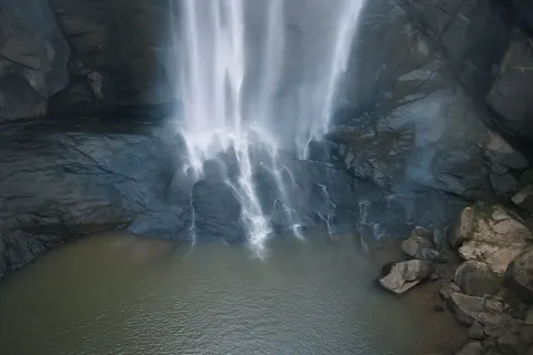 Plan your trip to Agaya Gangai Waterfalls in Kolli Hills with Karthi Travels® - View 3
