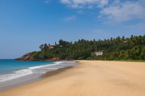 Samudra Beach in Kovalam - tourist attraction to visit with Karthi Travels